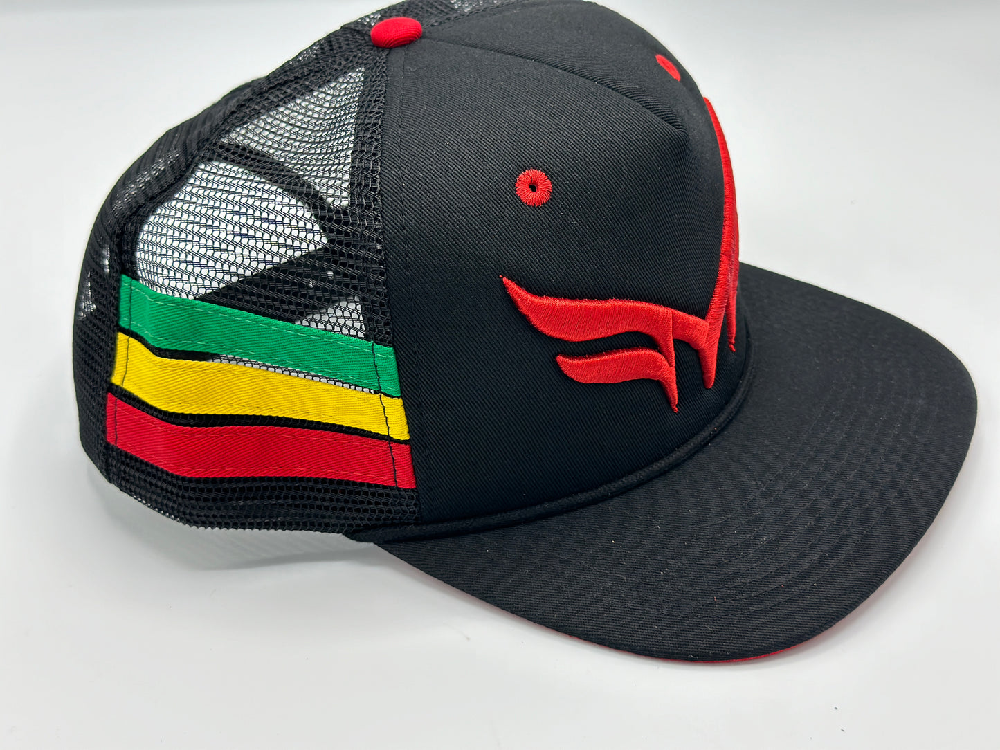 THE “RASTA“ TRUCKER MESH W/ RED 3D PUFF LOGO